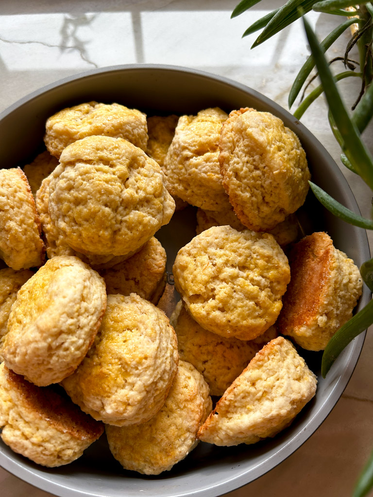 bowl piled high with golden shortcake biscuits